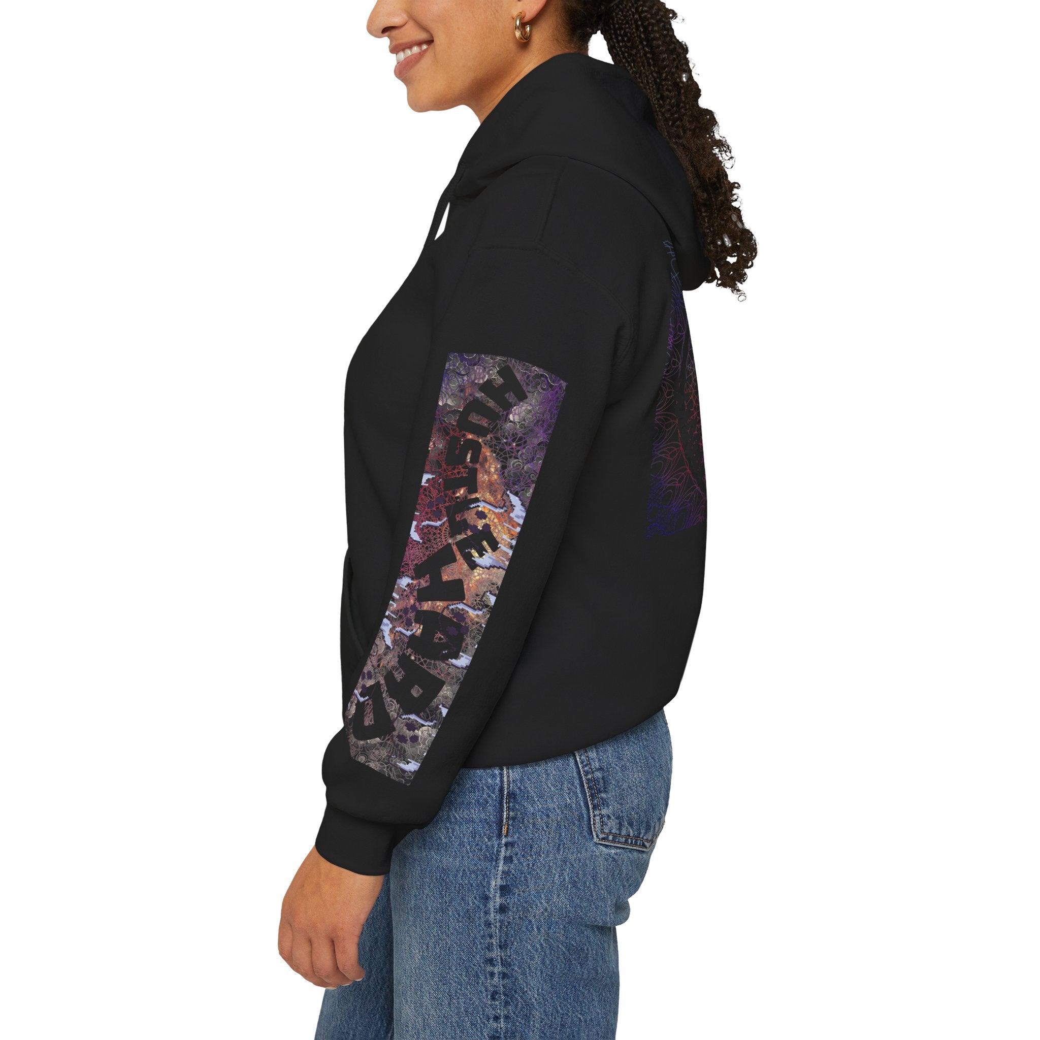 Person wearing a black hoodie with a colorful graphic on the back, standing against a white background