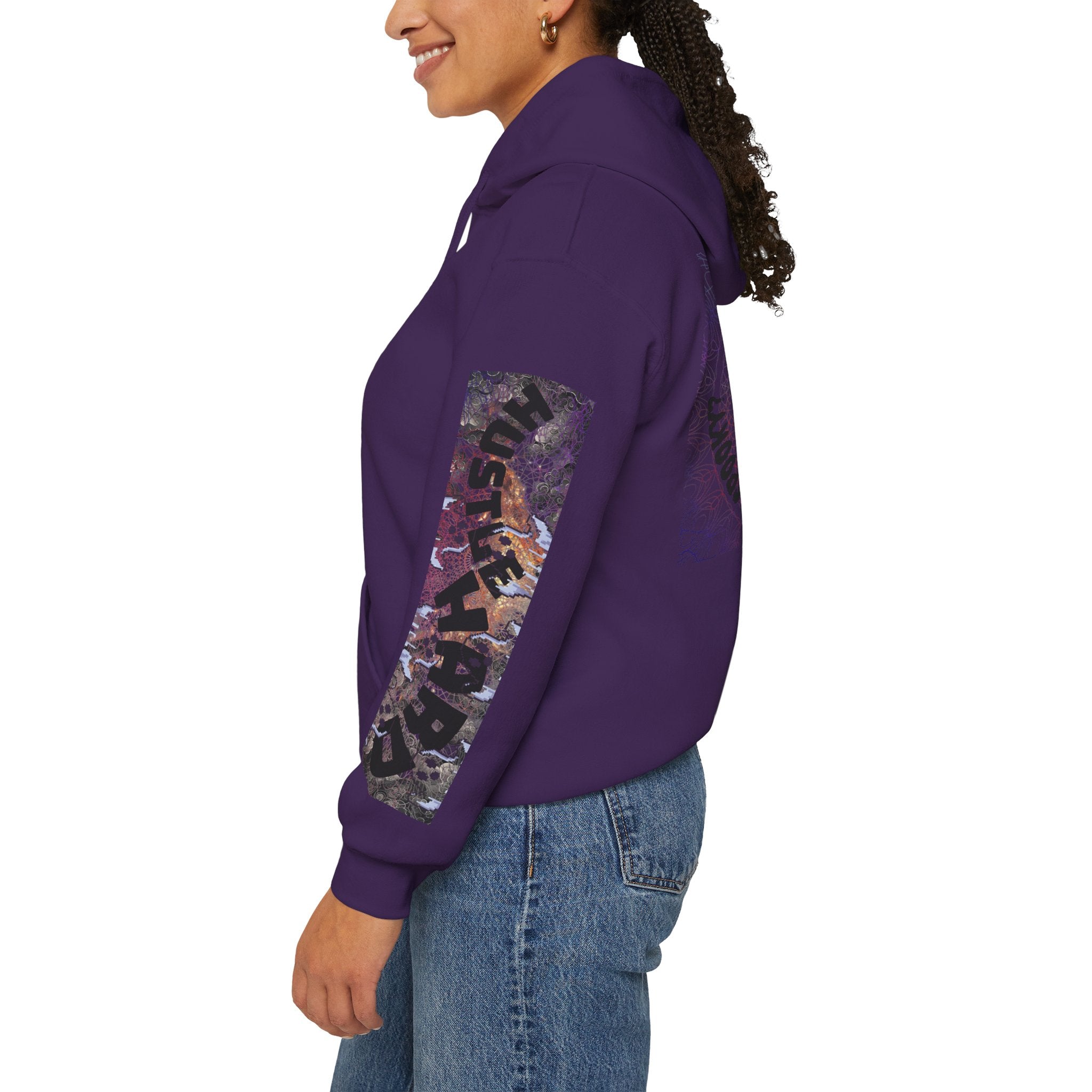 Person wearing a purple hoodie with a graphic design on the sleeve against a white background