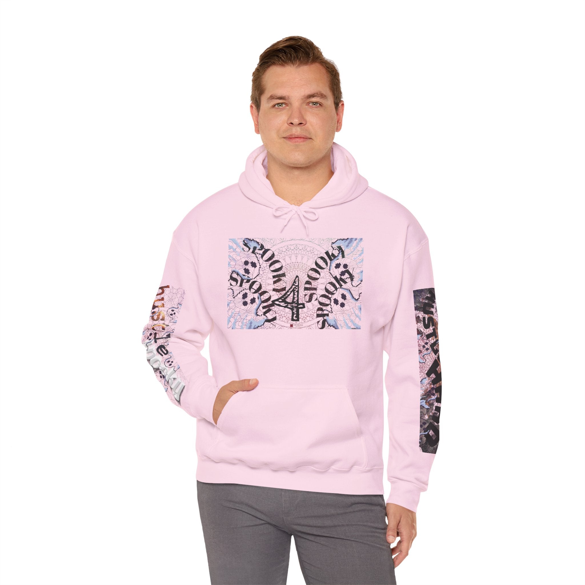 Man wearing a pink hoodie with colorful designs on a white background