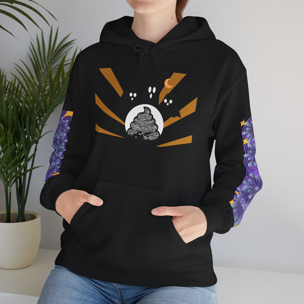 Person wearing a black hoodie with a unique design, standing indoors with a plant in the background.