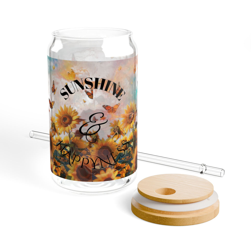 Glass candle holder with floral design and 'Sunshine & Happiness' text, accompanied by wooden coasters.