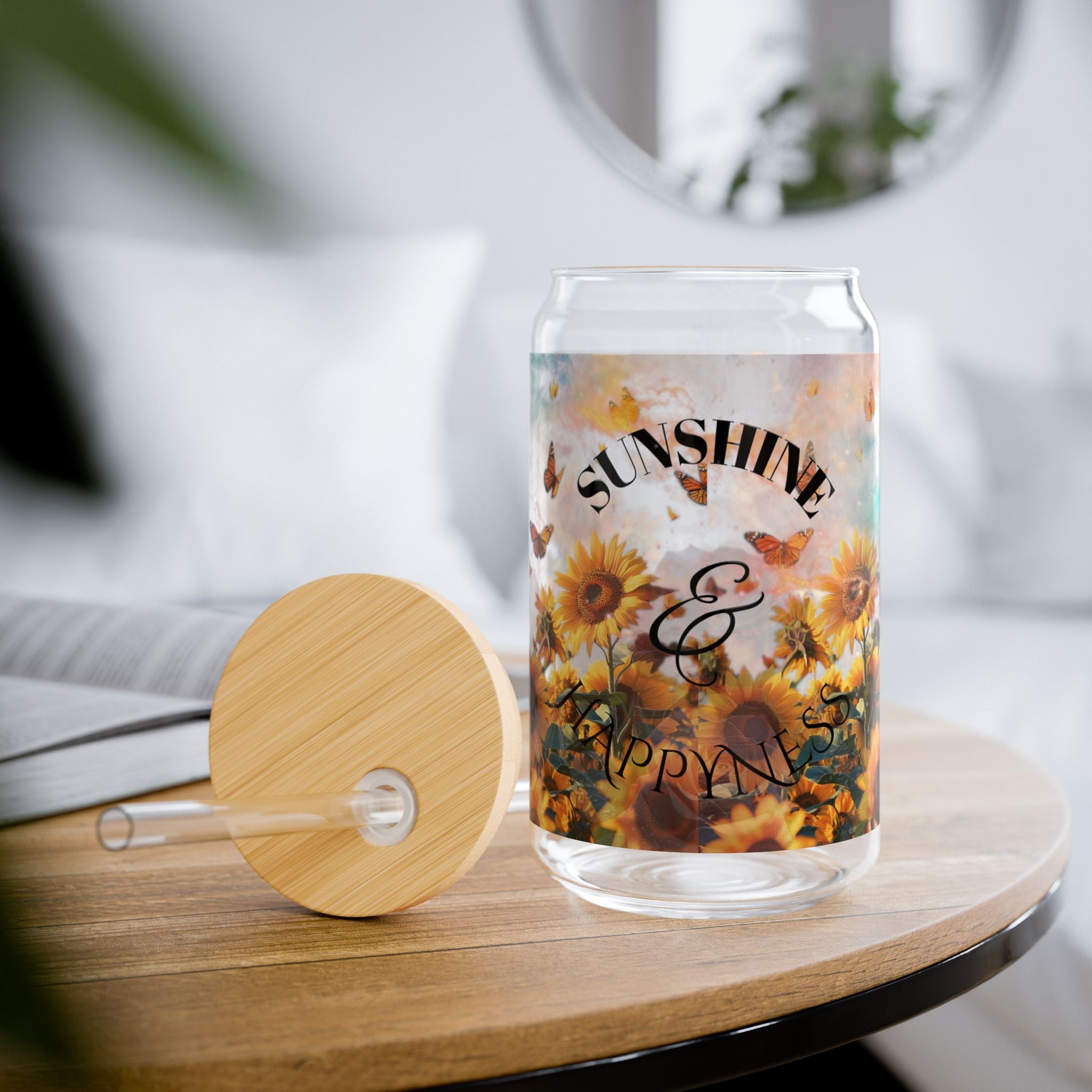 custom Glass can with floral design and text on a wooden table