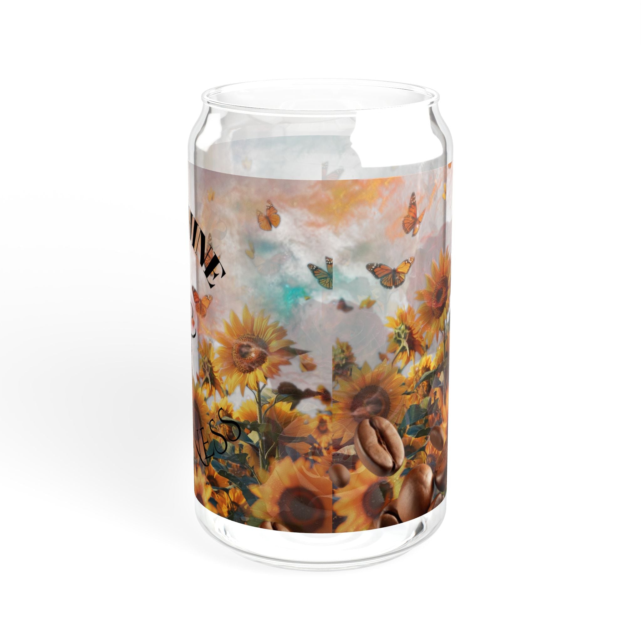 Clear glass candle holder with sunflower and coffee bean design on a white background