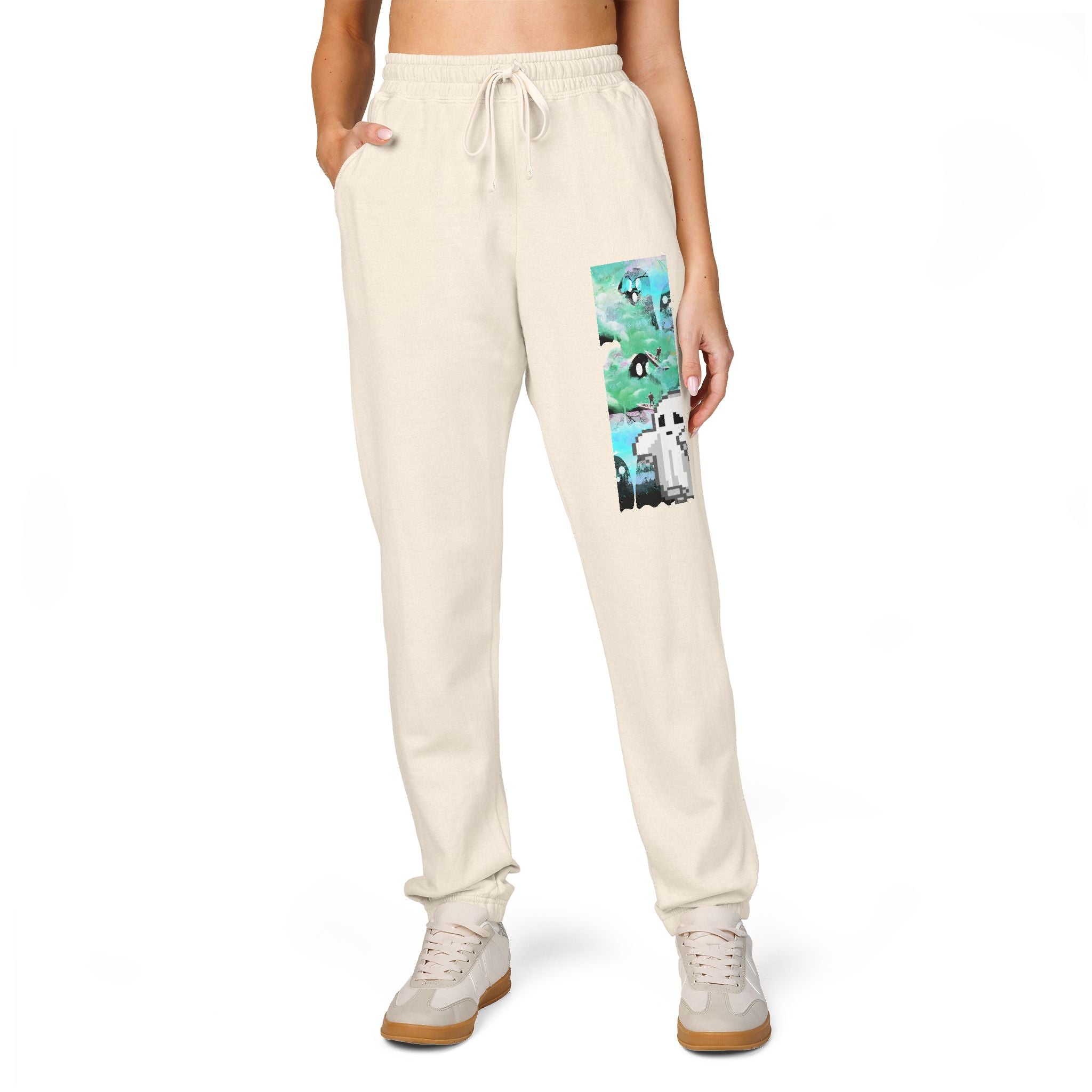 Beige sweatpants with a graphic design on a white background