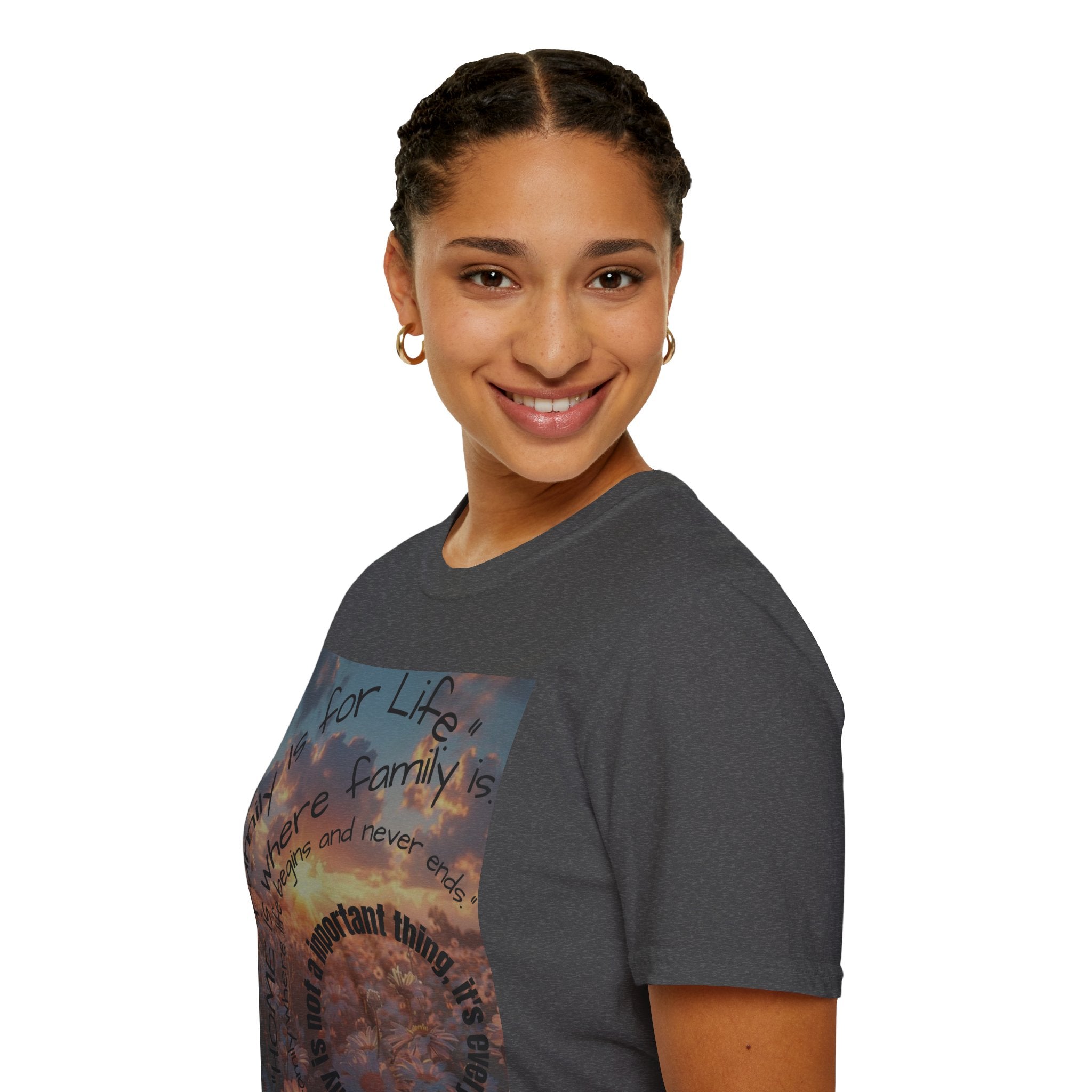 Person wearing a gray t-shirt with a colorful graphic design on a white background