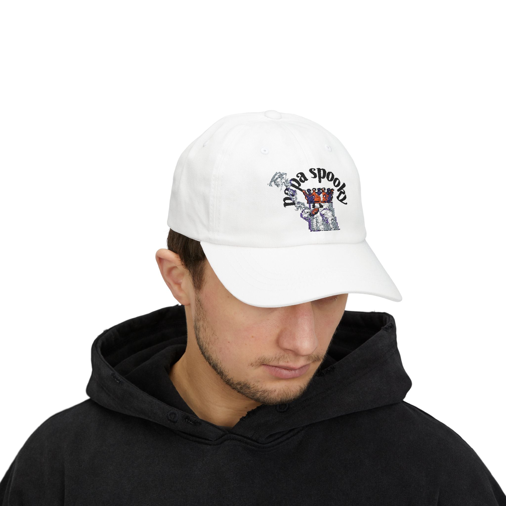 Person wearing a white cap with branding on a white background