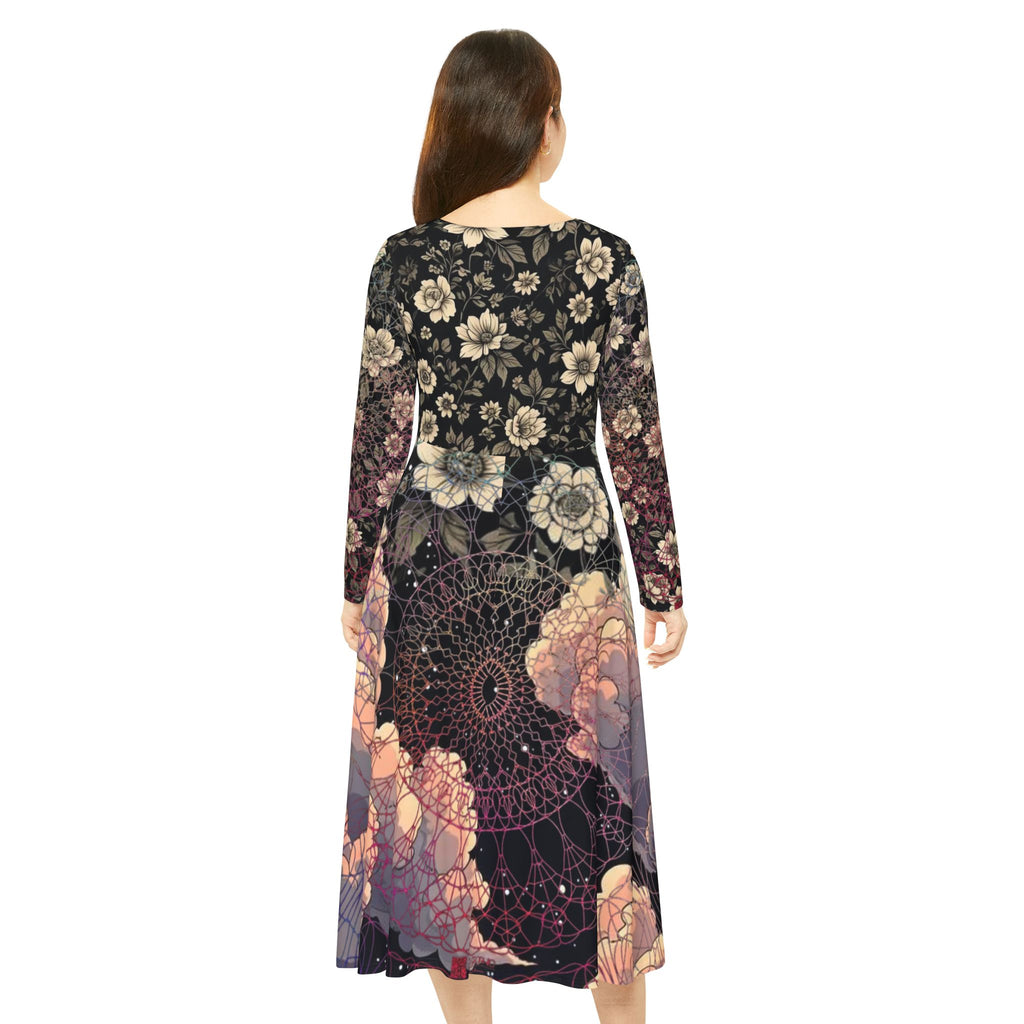 Woman wearing a long-sleeve dress with floral and geometric pattern on a white background