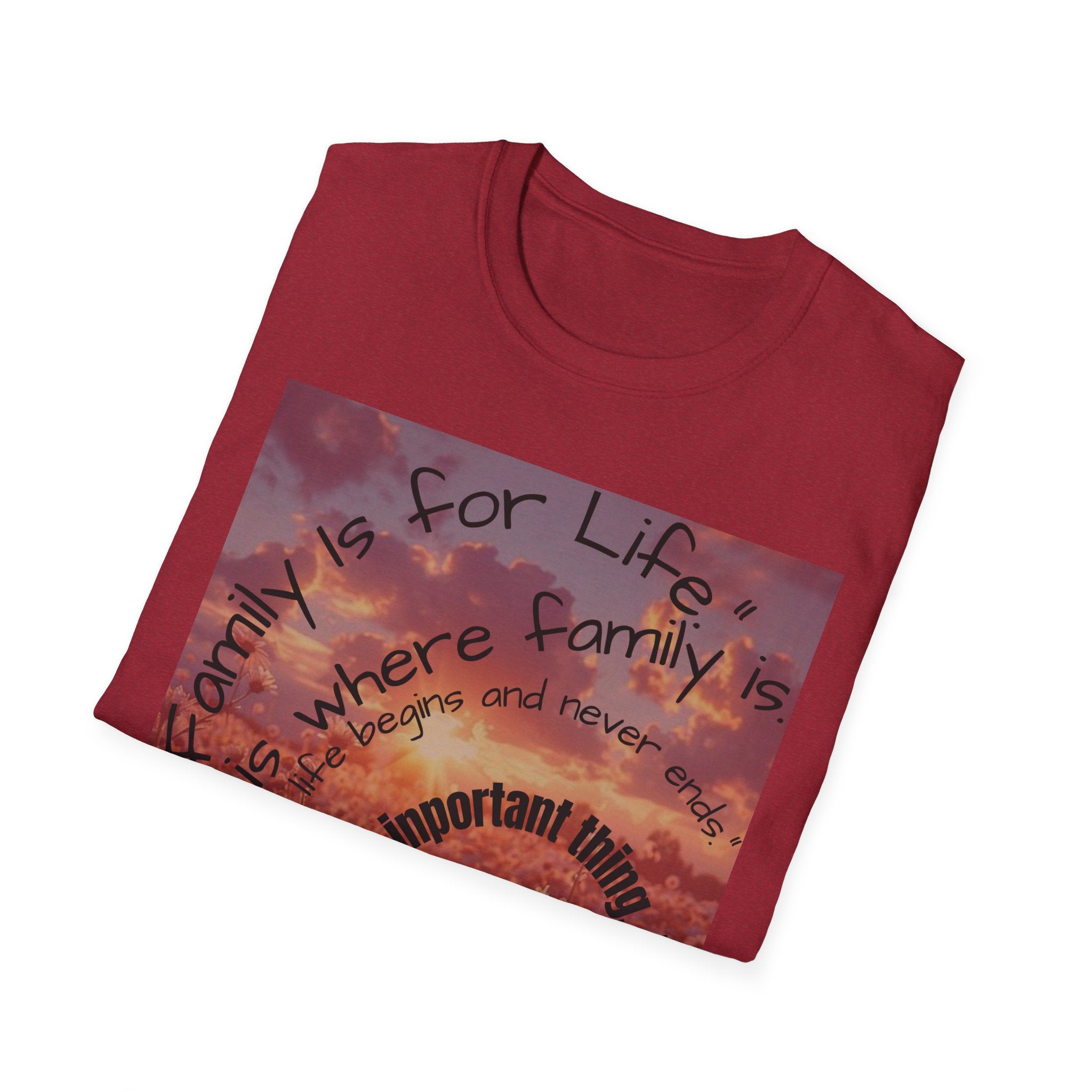 Folded red t-shirt with a graphic and text on a white background