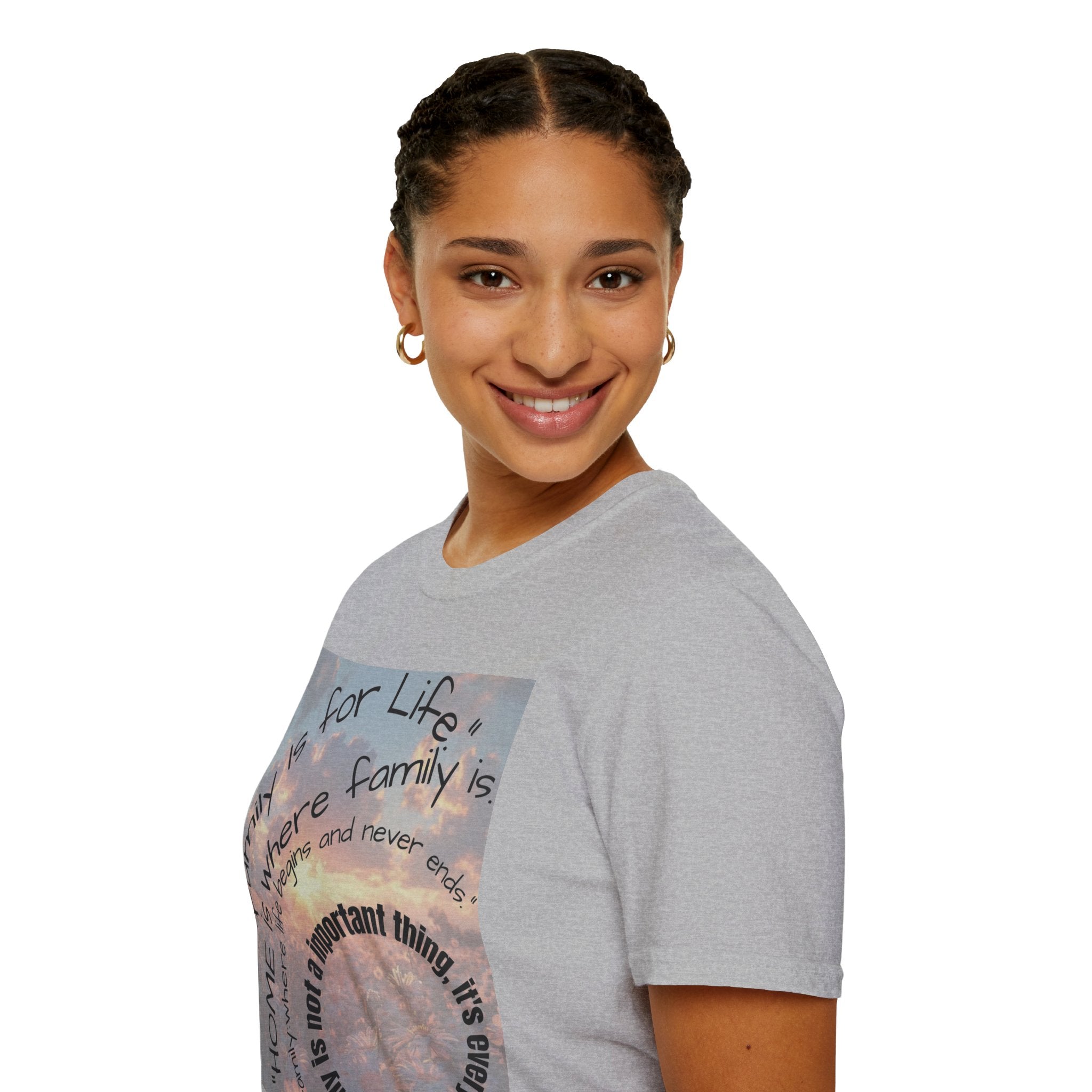 Person wearing a custom gray t-shirt with text and a graphic design on a white background